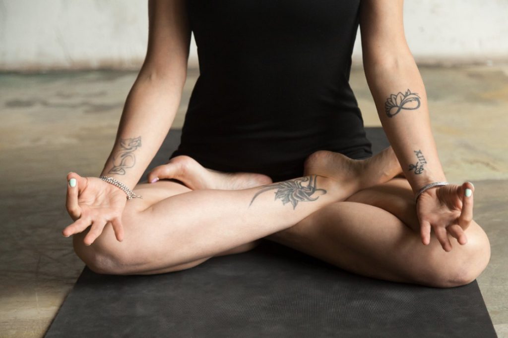 legs and hands in lotus pose