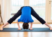 Wide-Legged Forward Bend (Prasarita Padottanasana): How to Do, Variations, & Benefits