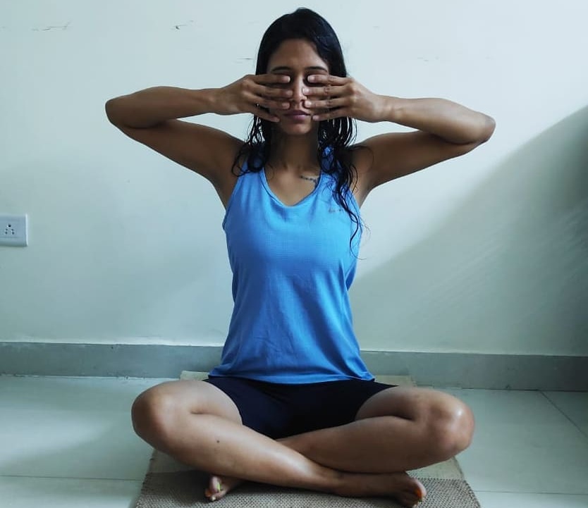 Bhramari Pranayama, a practice that has a calming effect on the mind and  body. 