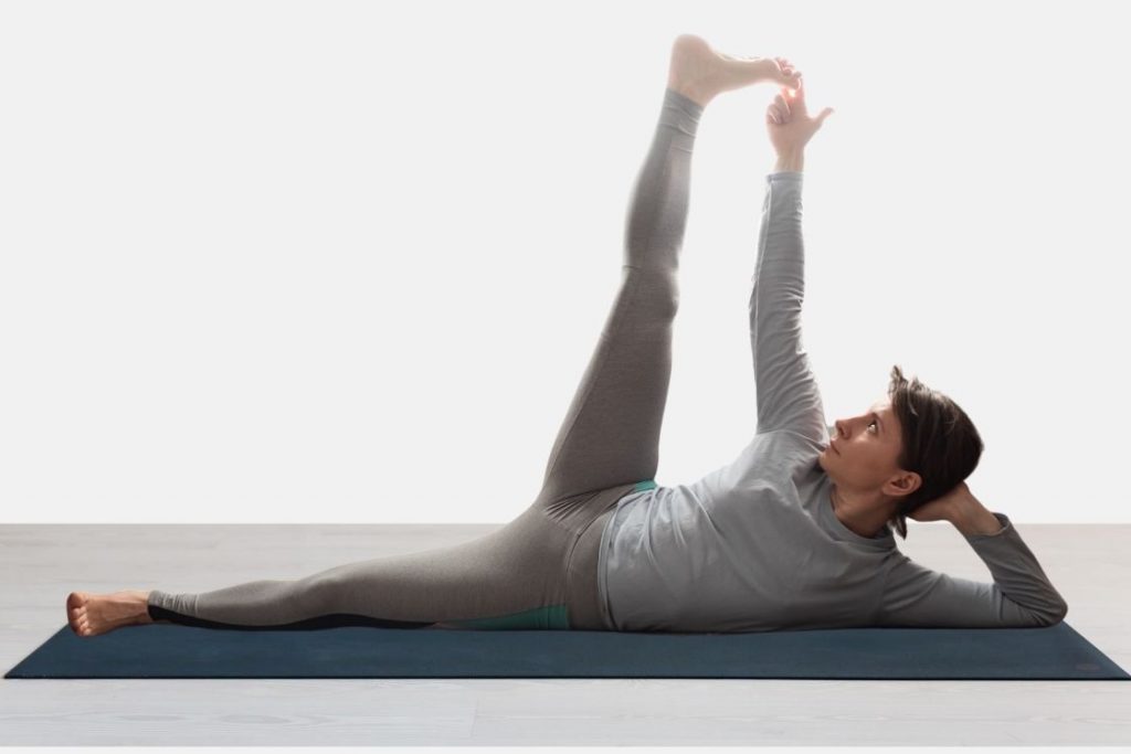 Anantasana - side reclining leg lift pose