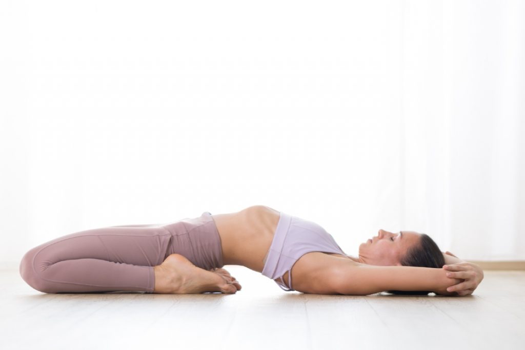 supta vajrasana (reclined thunderbolt pose)