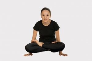 Tolasana Yoga (Scale Pose): Steps, Benefits, & Variations