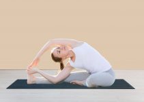 Parivrtta Janu Sirsasana: Steps, Variations, Contraindications & Benefits