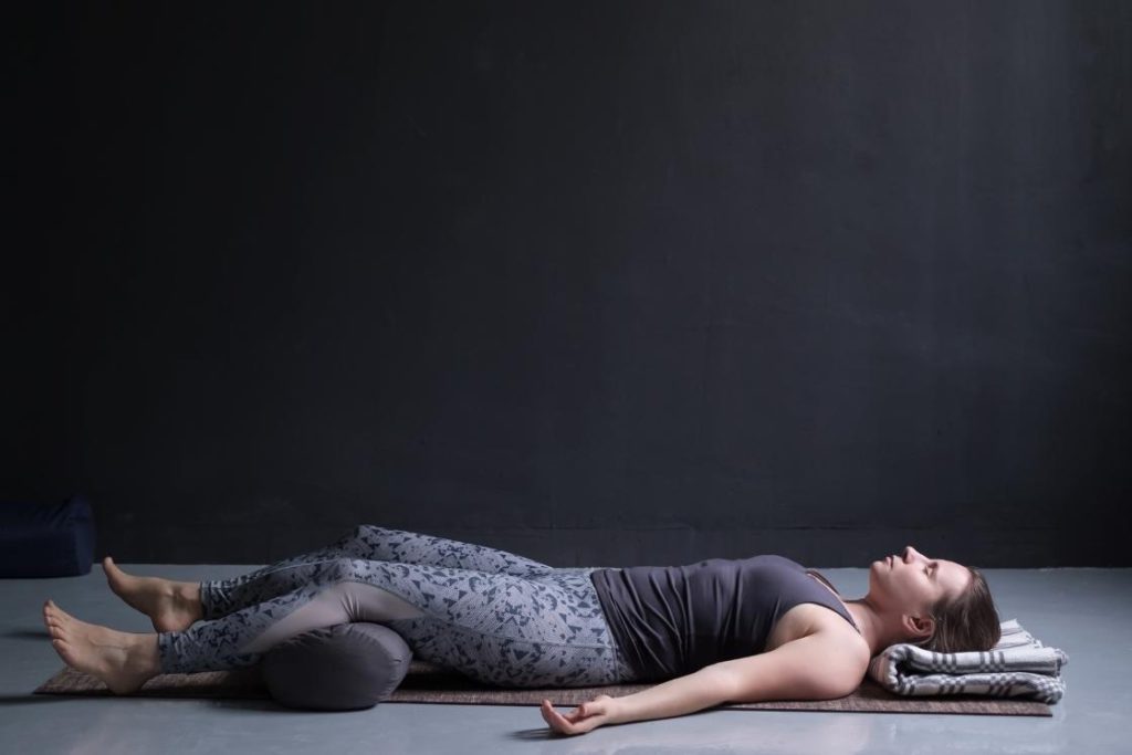 shavasana with bolster