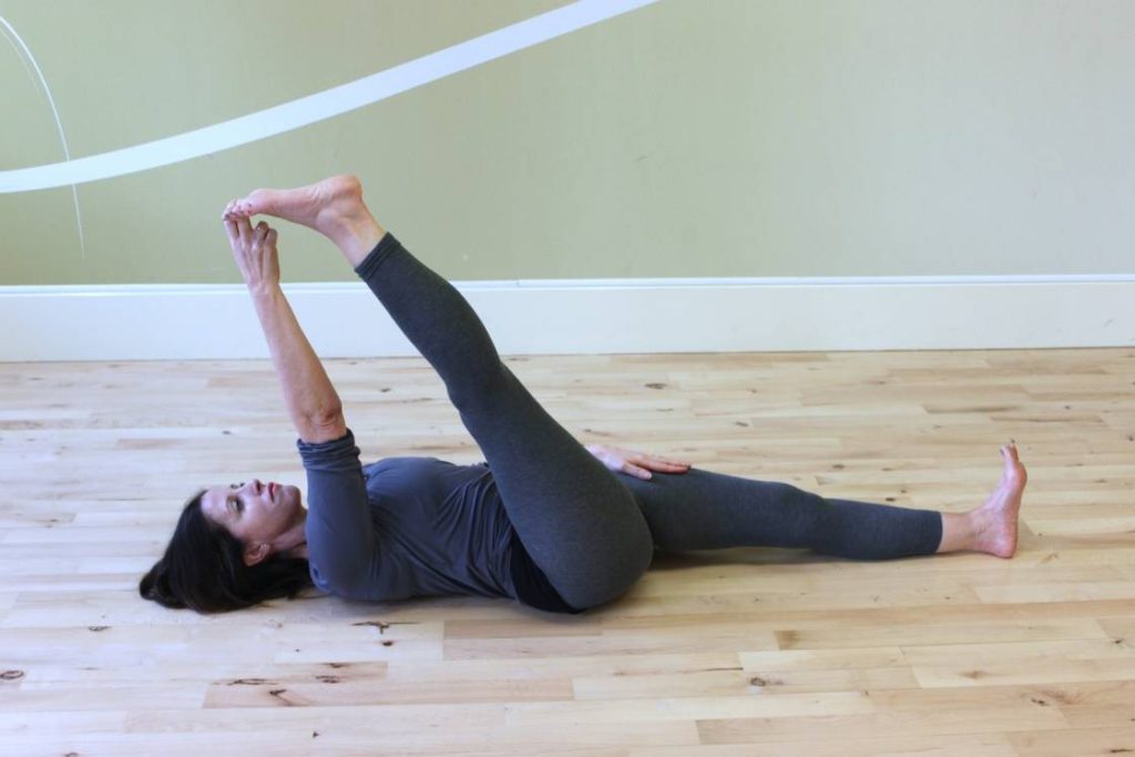 supta padangusthasana (reclining big toe Pose)