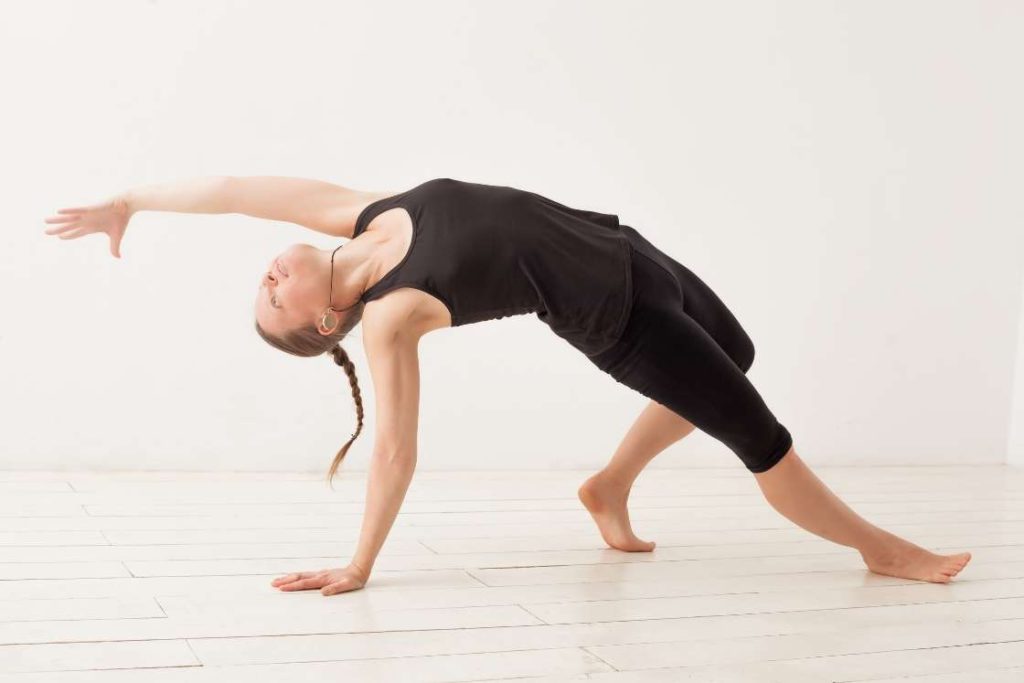 Camatkarasana (Wild Thing Pose)