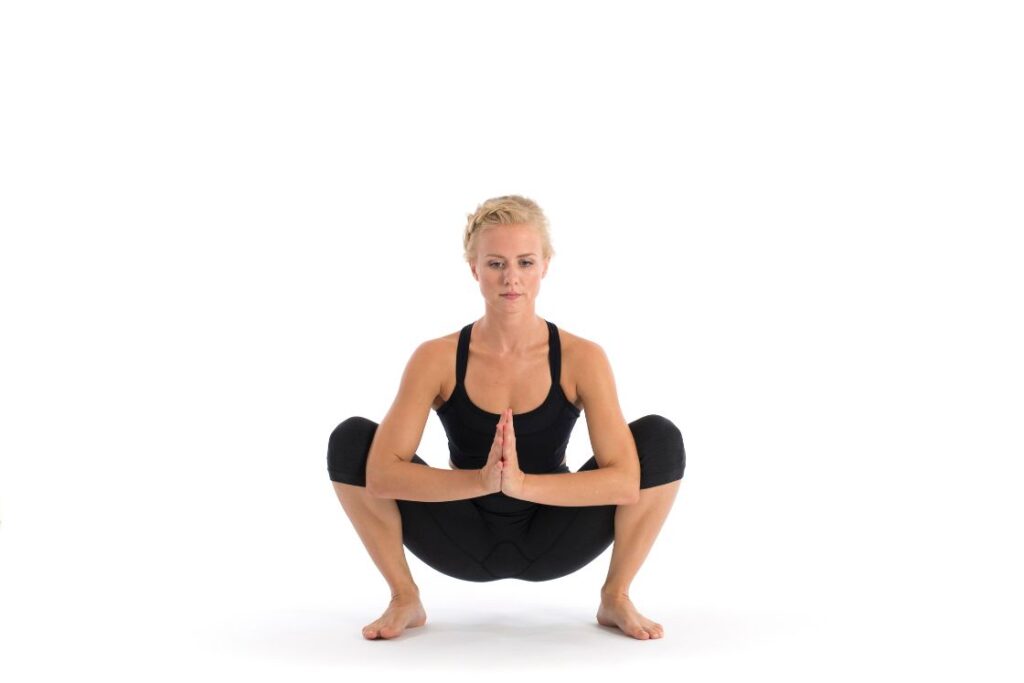 Garland yoga pose for IBS relief