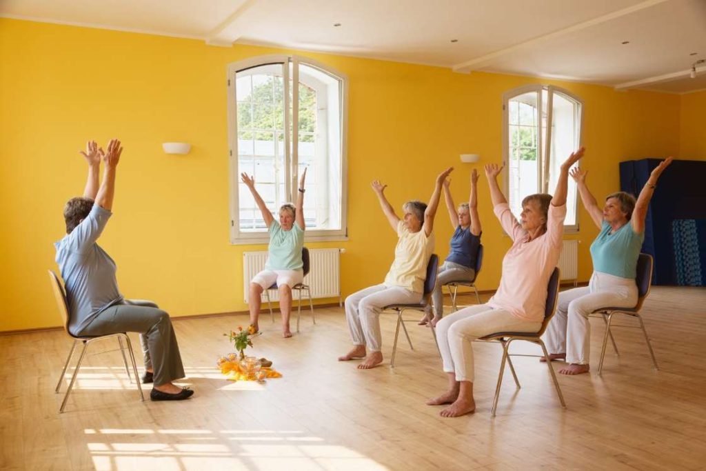 Chair Yoga For Seniors 8 Chair Yoga Poses Seniors Can Do Easily At Home Fitsri