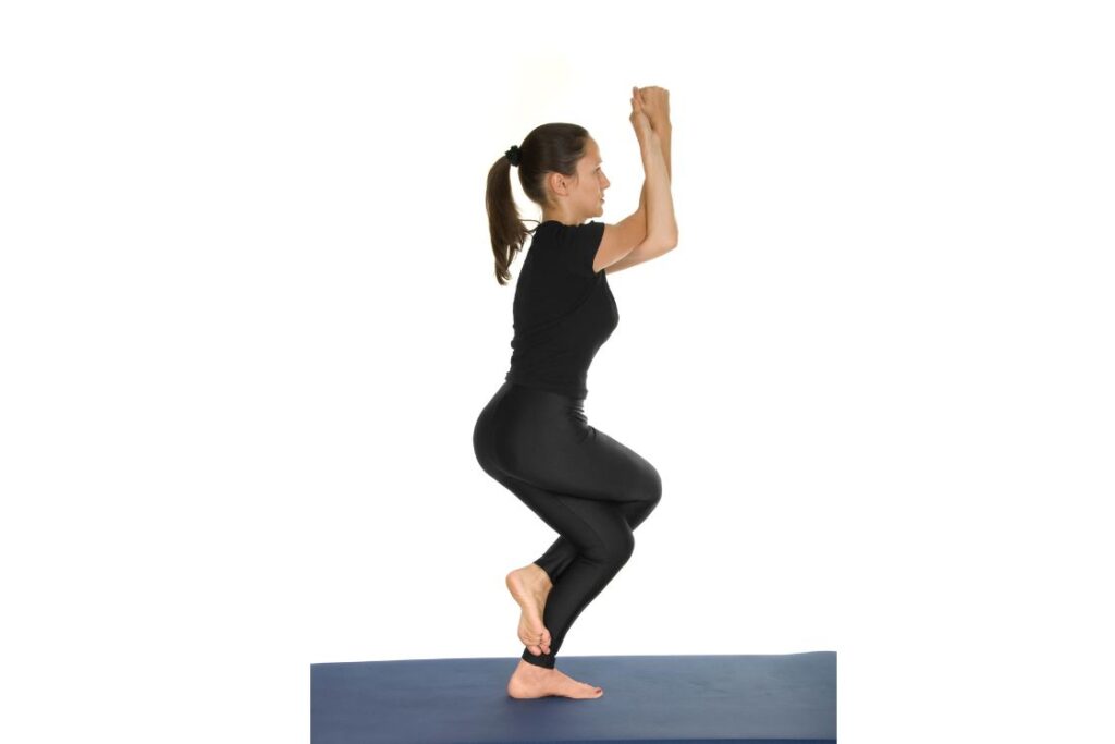 Eagle yoga pose for golfers