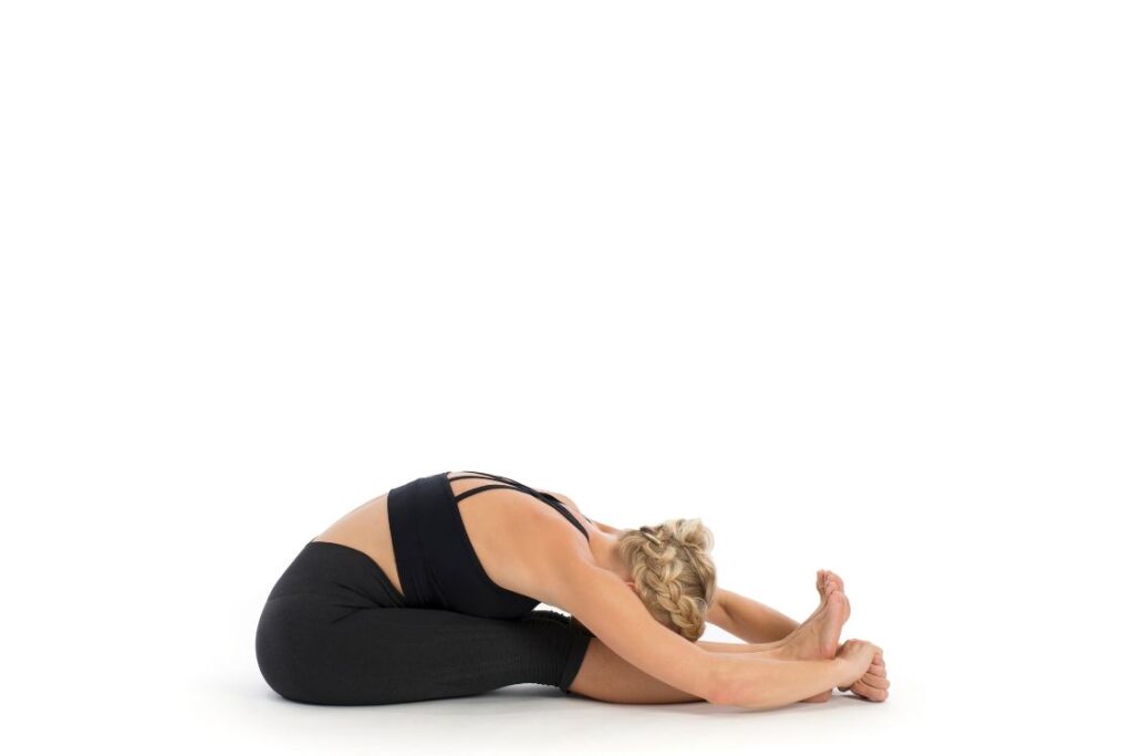 seated forward bend yoga pose for IBS relief