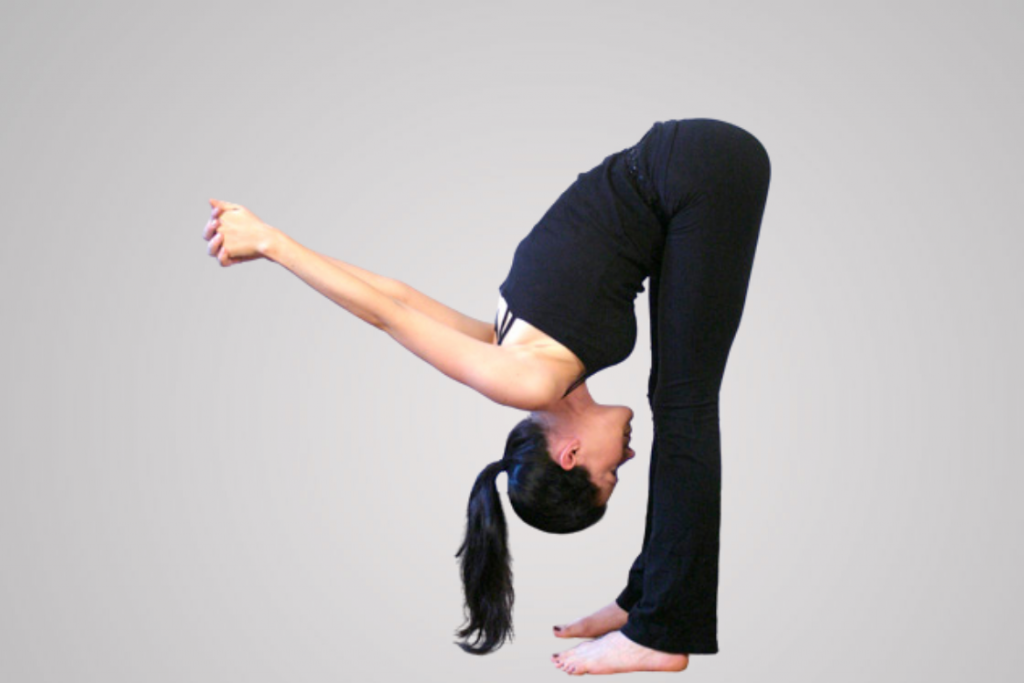 Young sporty woman practicing yoga at home doing asana Trianga Dandasana. Staff  pose with leg up. Wellbeing and healthy lifestyle concept Stock Photo -  Alamy