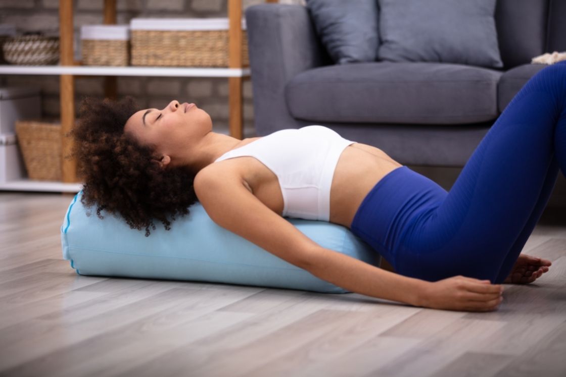How to Use Bolster in Yoga Poses (and Benefits of Using It)
