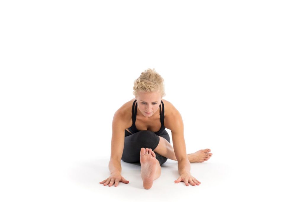 Gomukhasana (Cow Face Pose): How to Perform, Benefits, & Precautions